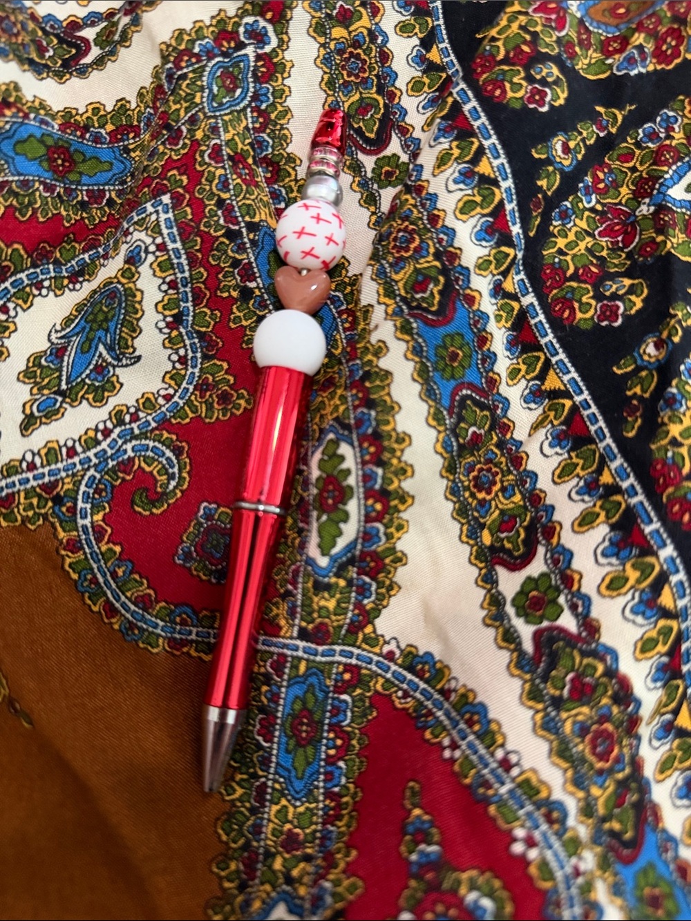 Red Beaded Ballpoint Pen with Decorative Accents